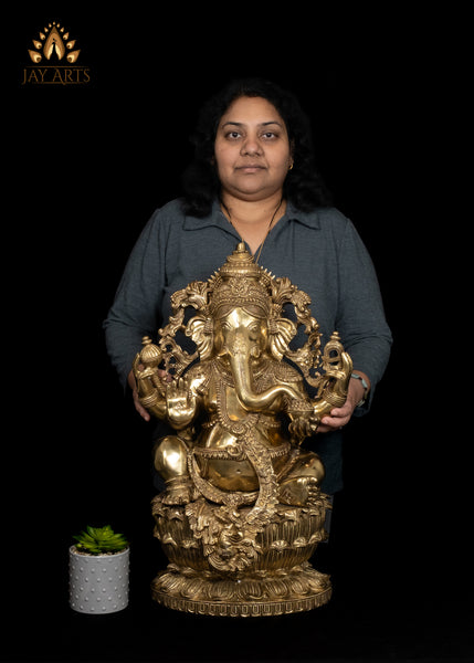 26" Brass Raja Ganapati seated on a Double Lotus Pedestal Wearing Elaborate Ornaments