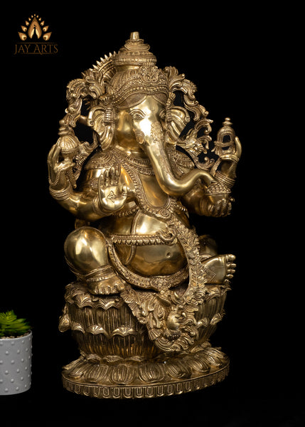 26" Brass Raja Ganapati seated on a Double Lotus Pedestal Wearing Elaborate Ornaments