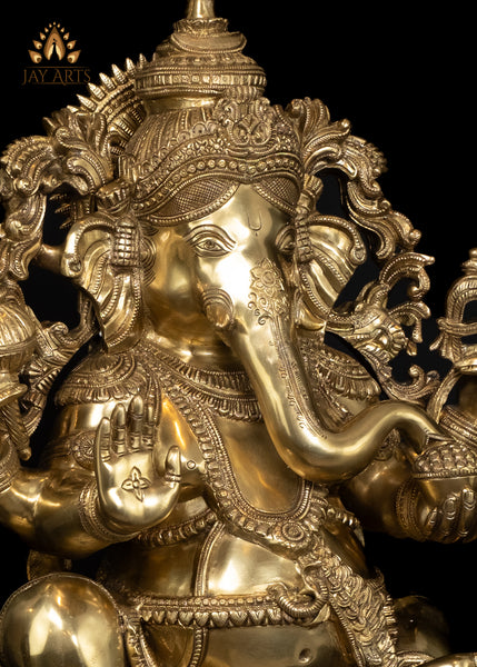 26" Brass Raja Ganapati seated on a Double Lotus Pedestal Wearing Elaborate Ornaments