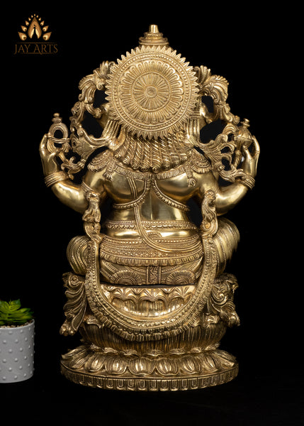 26" Brass Raja Ganapati seated on a Double Lotus Pedestal Wearing Elaborate Ornaments