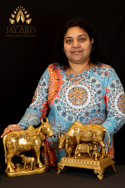 Cow and a Calf with Figurines of Gods and Goddesses